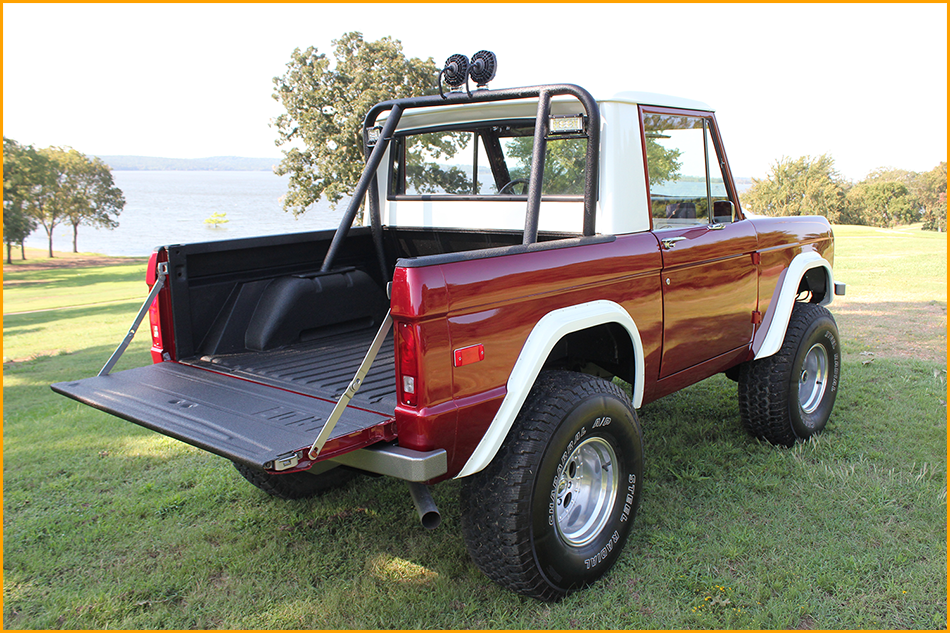 1970 red and white trim Ford Bronco.
