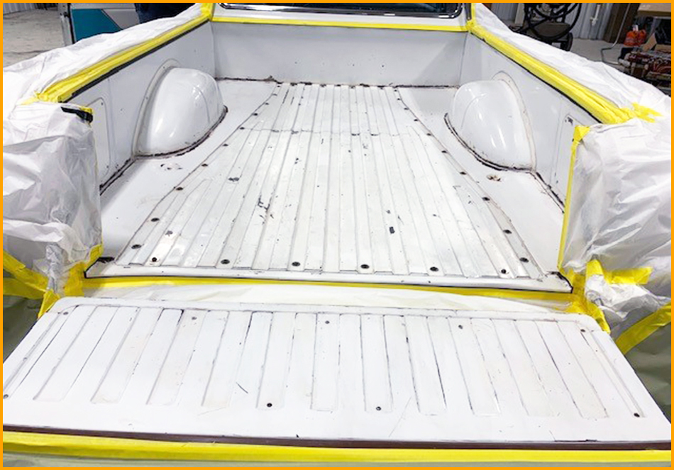 Ford Ranchero bed is sanded and taped, ready for installation of GatorHyde spray polyurea.