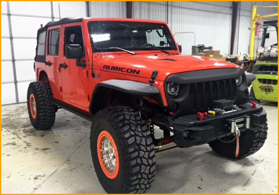 Jeep Rubicon has rear bumper, fenders, grill and front bumper sprayed with GatorHyde.