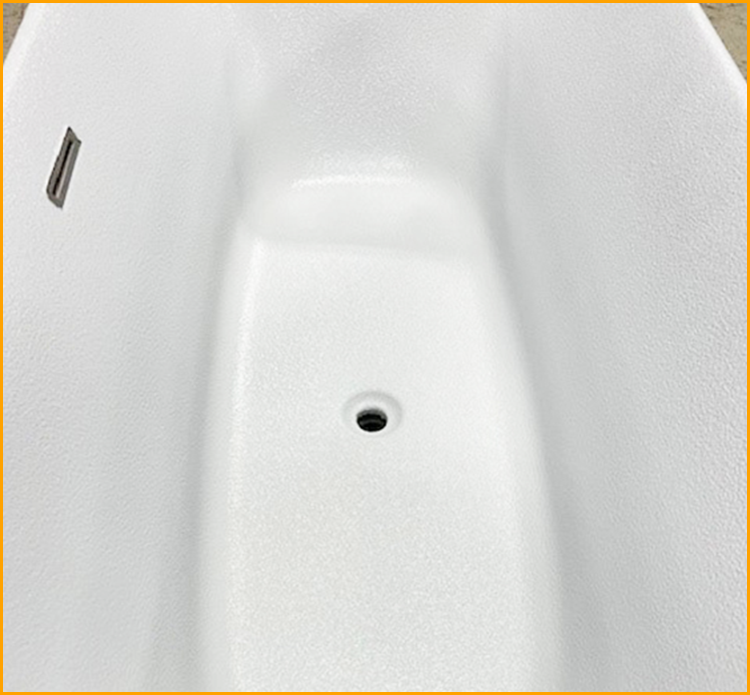 Fiberglass bath tub sprayed with GatorHyde and topcoated with a white aliphatic paint.